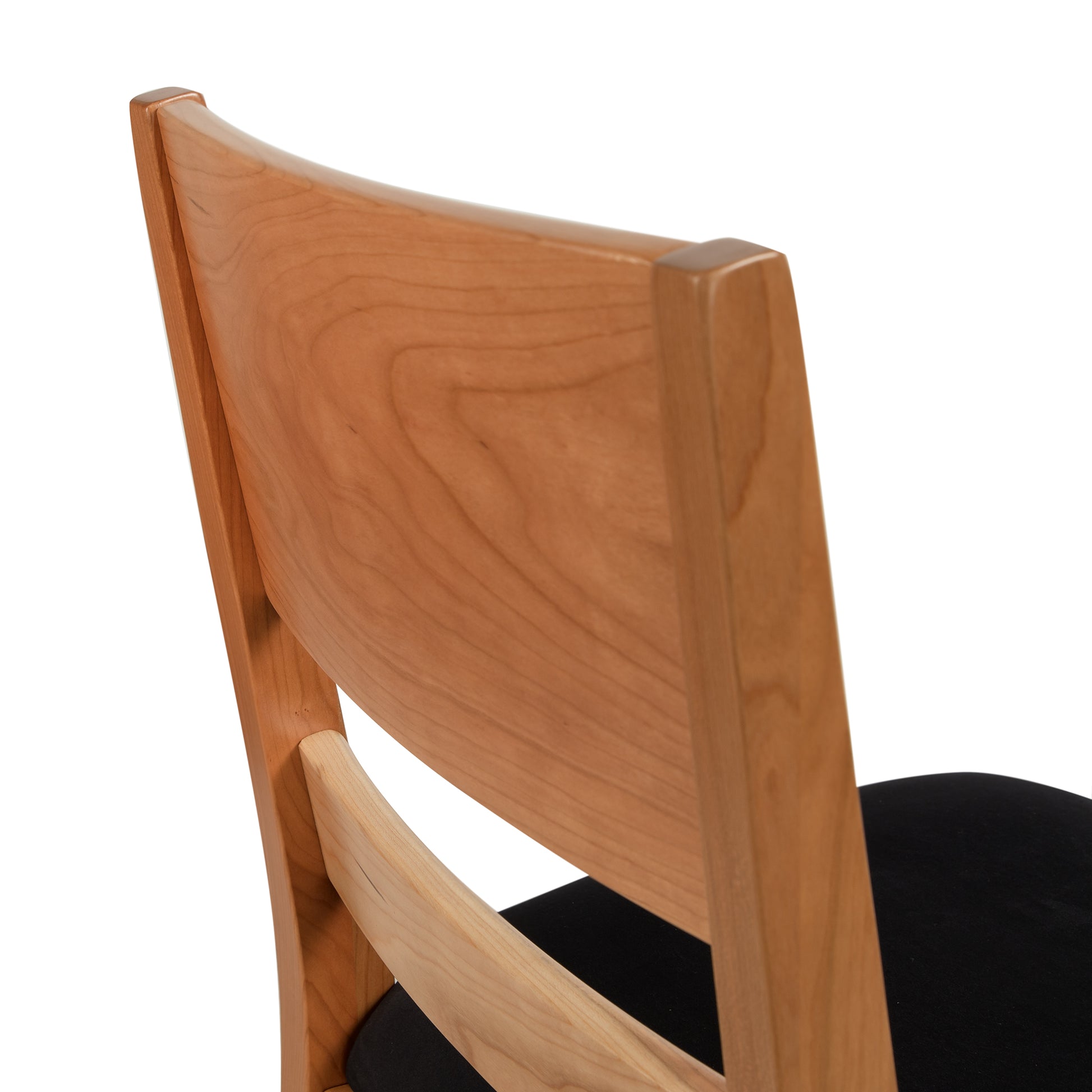 Burke Modern Chair with black upholstery, solid wood frame, and Scandinavian-inspired design by Vermont Woods Studios. American made craftsmanship.