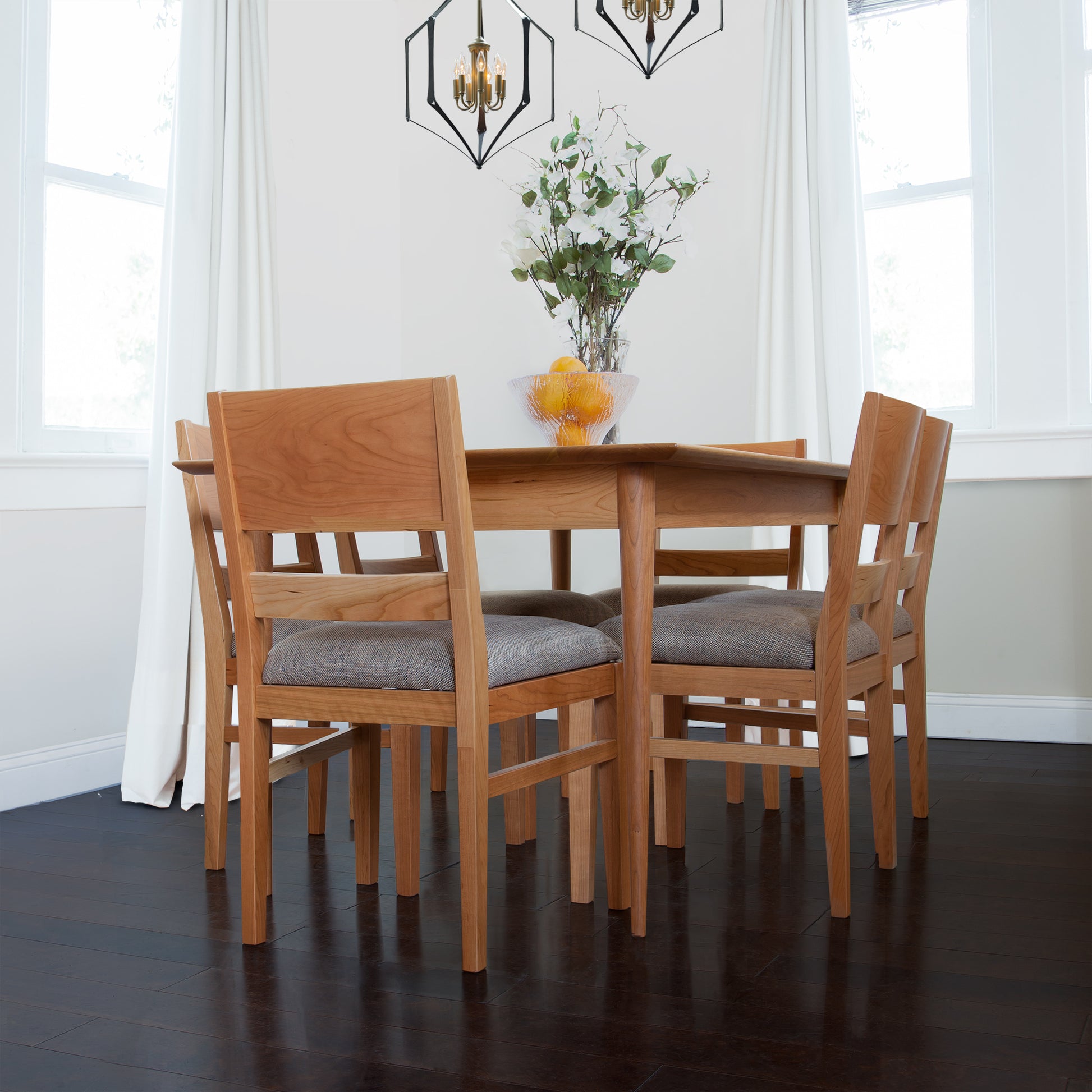 Burke Modern Chair with black upholstery by Vermont Woods Studios, showcasing American-made craftsmanship and sleek design.