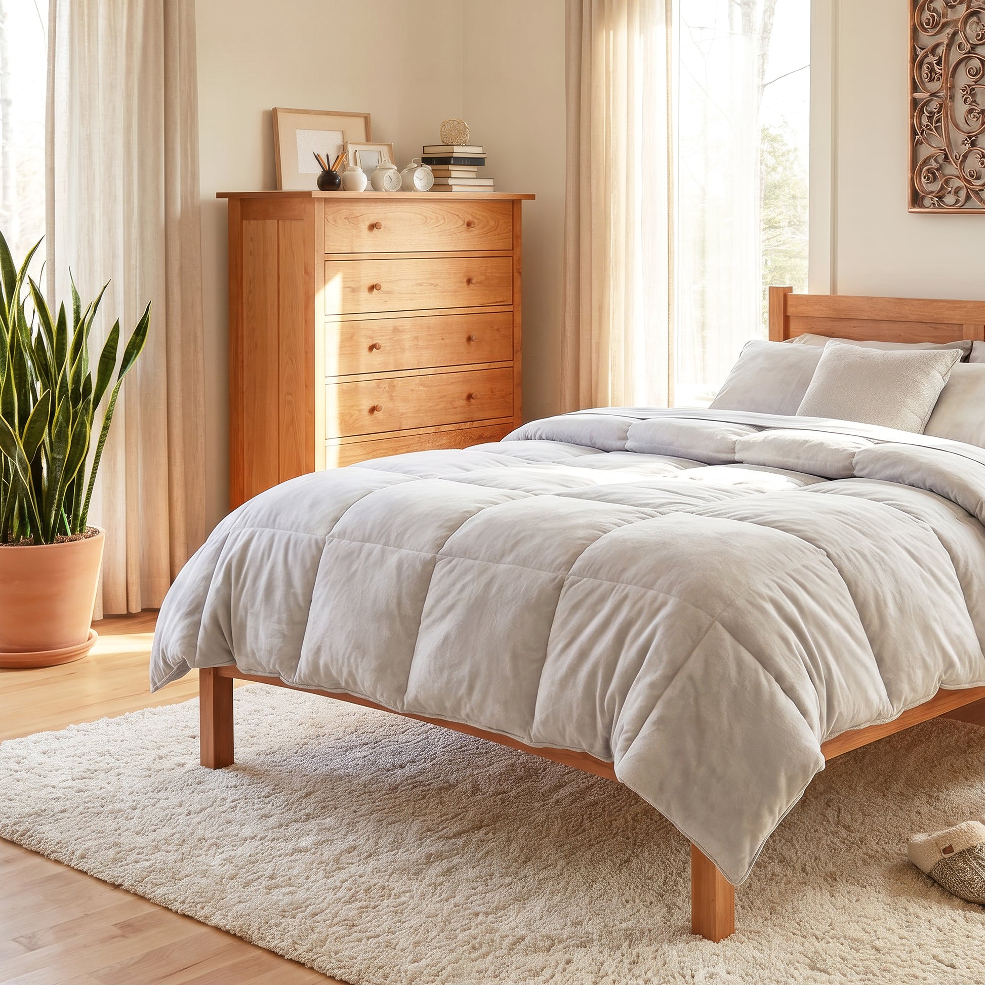Vermont Furniture Designs Burlington Shaker 6-Drawer Chest and wooden bed showcased in a bright bedroom, highlighting handcrafted American-made quality.