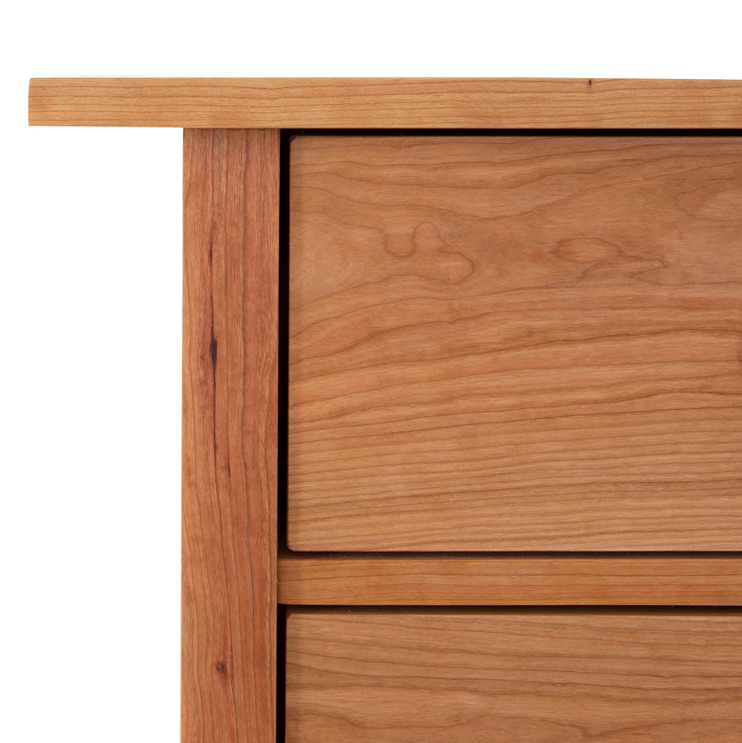 Detail of Vermont Furniture Designs Heartwood Shaker 7-Drawer Chest highlighting smooth wood grain and timeless handcrafted American quality.
