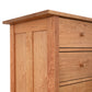 Vermont Furniture Designs Heartwood Shaker 7-Drawer Chest in natural wood finish, featuring classic round knobs and fine American craftsmanship.