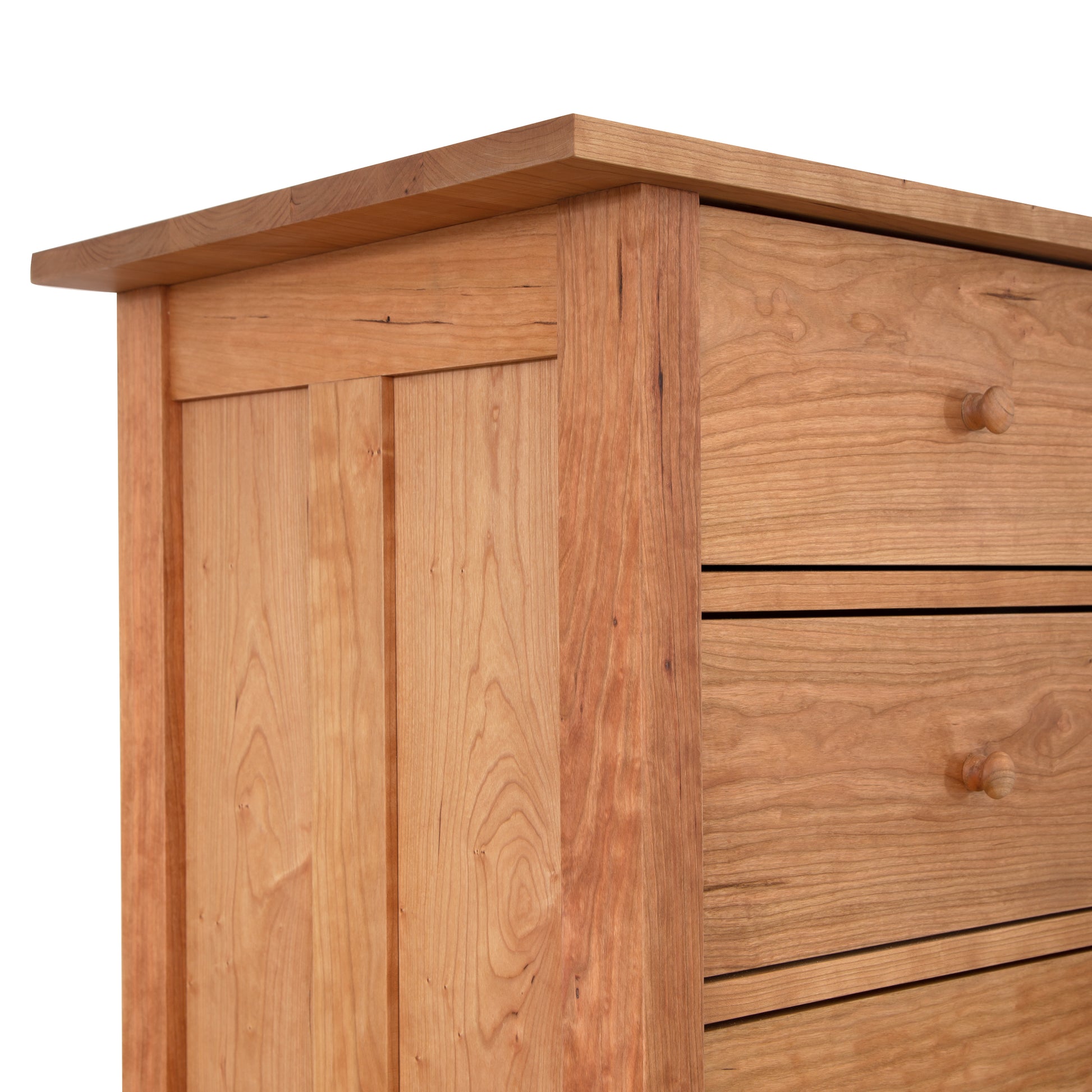 Vermont Furniture Designs Heartwood Shaker 7-Drawer Chest in natural wood finish, featuring classic round knobs and fine American craftsmanship.