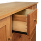 Burlington Shaker 8-Drawer 2-Door Dresser showcasing dovetail joints, wood knobs, and an eco-friendly oil finish in solid hardwood craftsmanship.