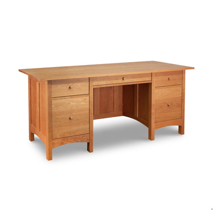 Burlington Shaker Executive Desk in solid wood with four drawers and central chair space, handcrafted by Vermont Furniture Designs.
