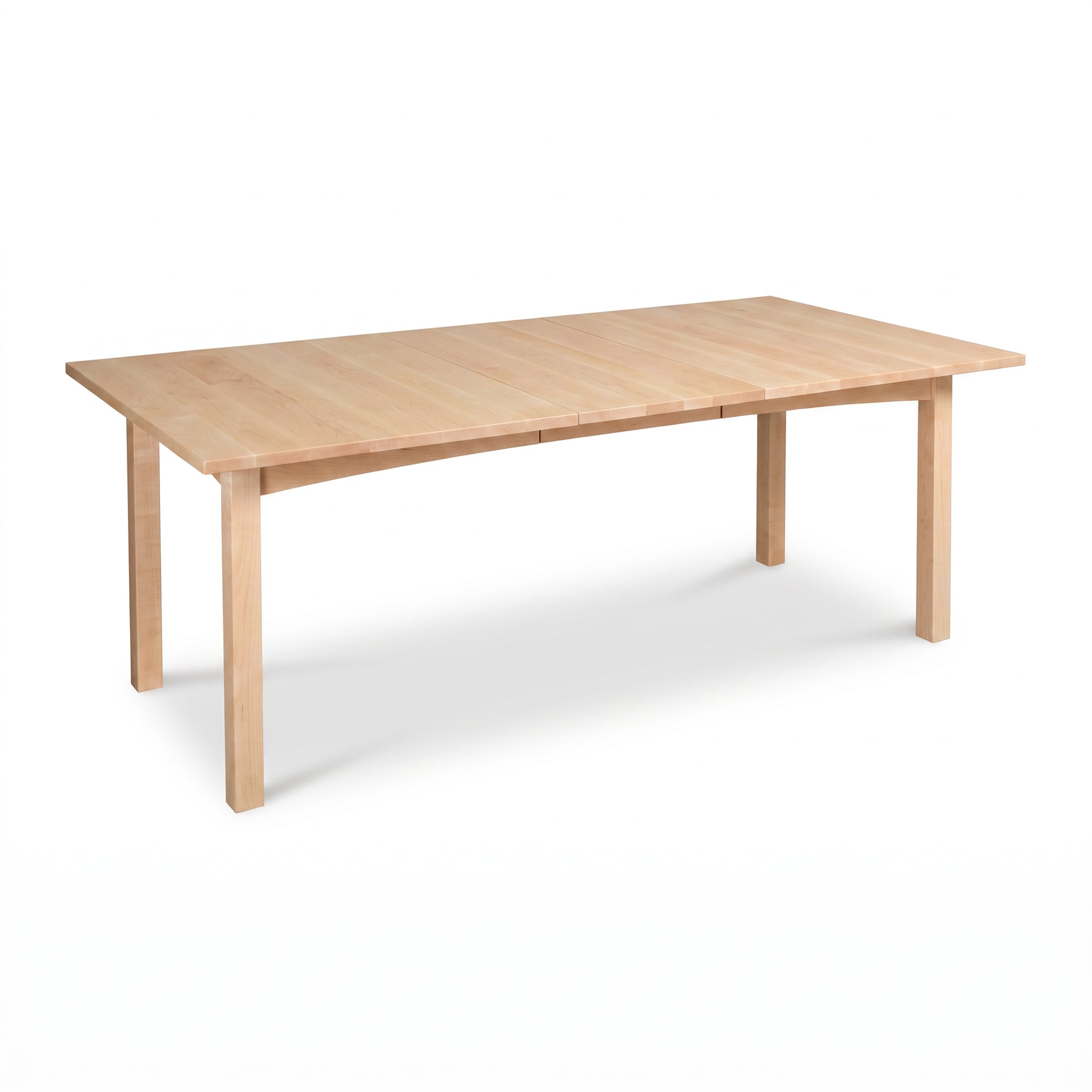 Burlington Shaker Extension Dining Table in solid wood with a light natural finish and four legs, crafted by Vermont Furniture Designs.