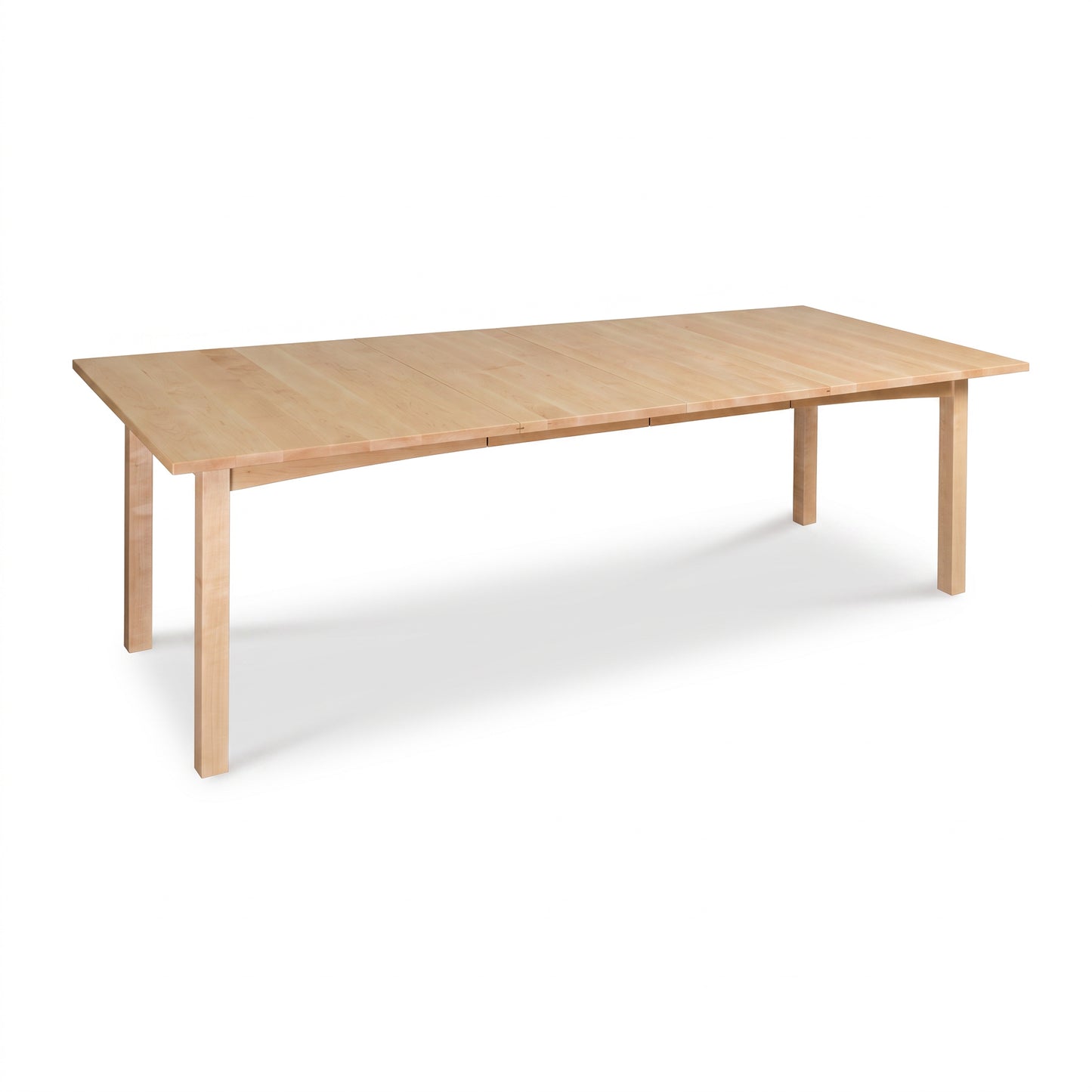 Burlington Shaker Extension Dining Table by Vermont Furniture Designs showcases solid wood craftsmanship and straight legs.
