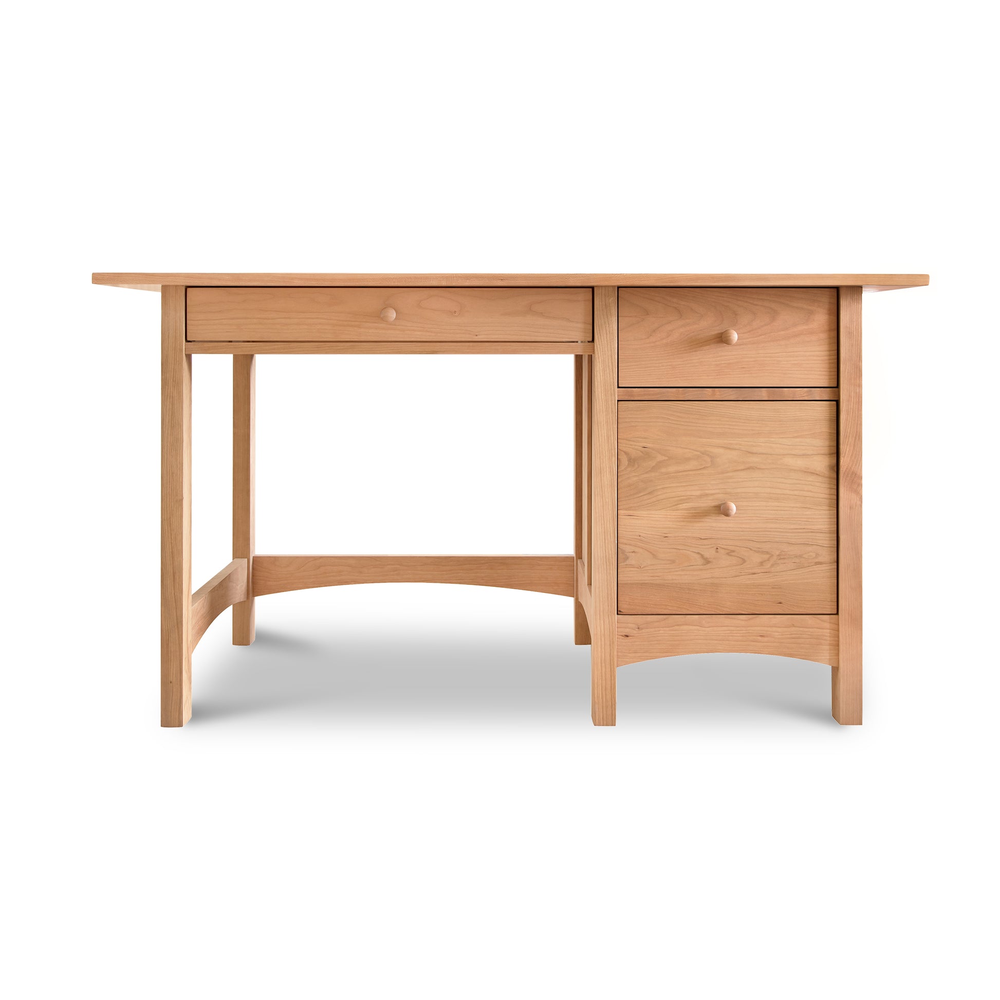 Burlington Shaker Study Desk by Vermont Furniture Designs with three right drawers and one center drawer, crafted from solid wood.