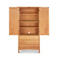 Burlington Shaker Tall Armoire: double doors, three circular shelves, and three drawers by Vermont Furniture Designs.