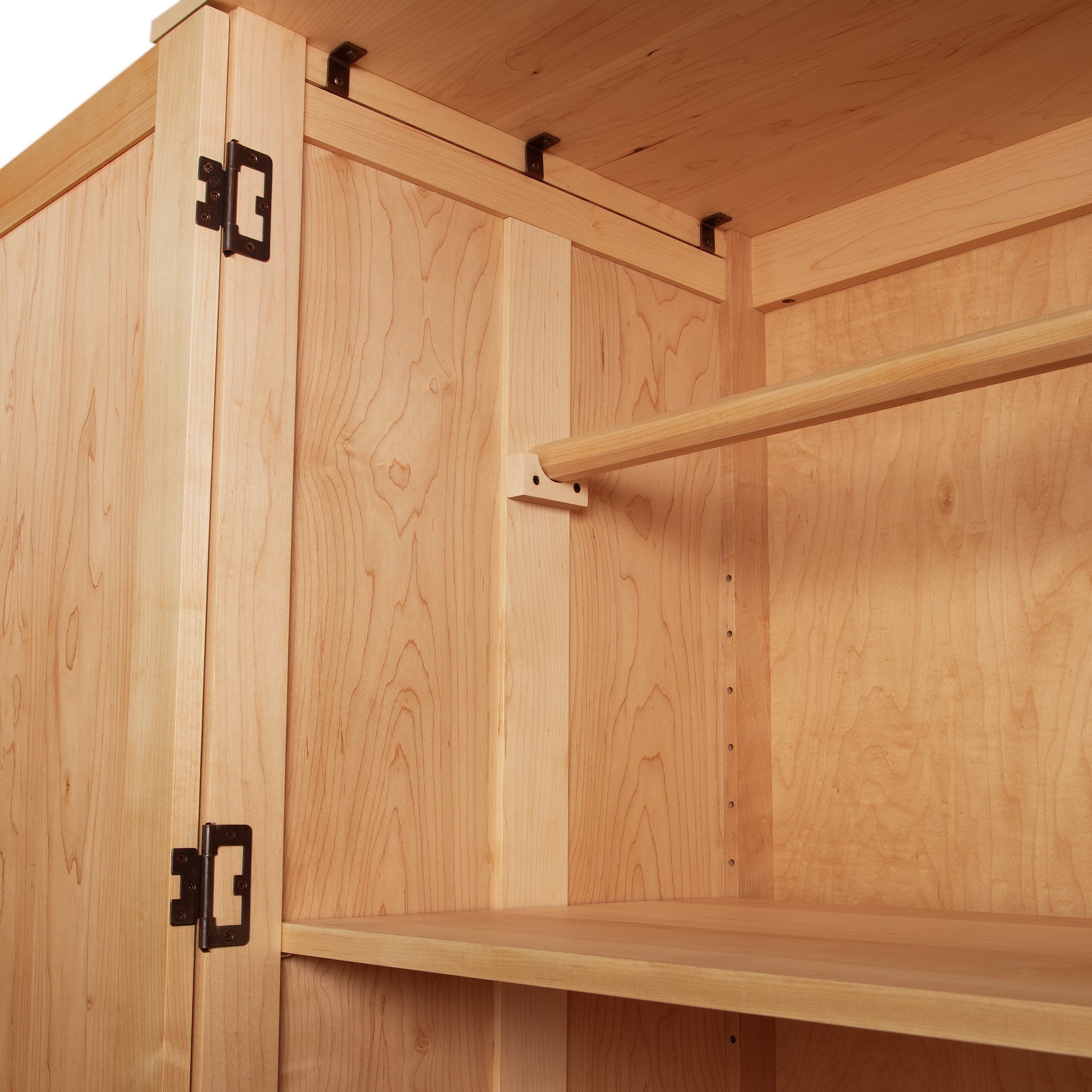 Burlington Shaker Tall Armoire featuring natural wood grain, hanging rod, shelves, and metal hinges by Vermont Furniture Designs.