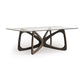 Butterfly Glass Top Dining Table by Copeland Furniture with a sculptural hardwood base and clear tempered glass top, showcasing elegant, modern craftsmanship.
