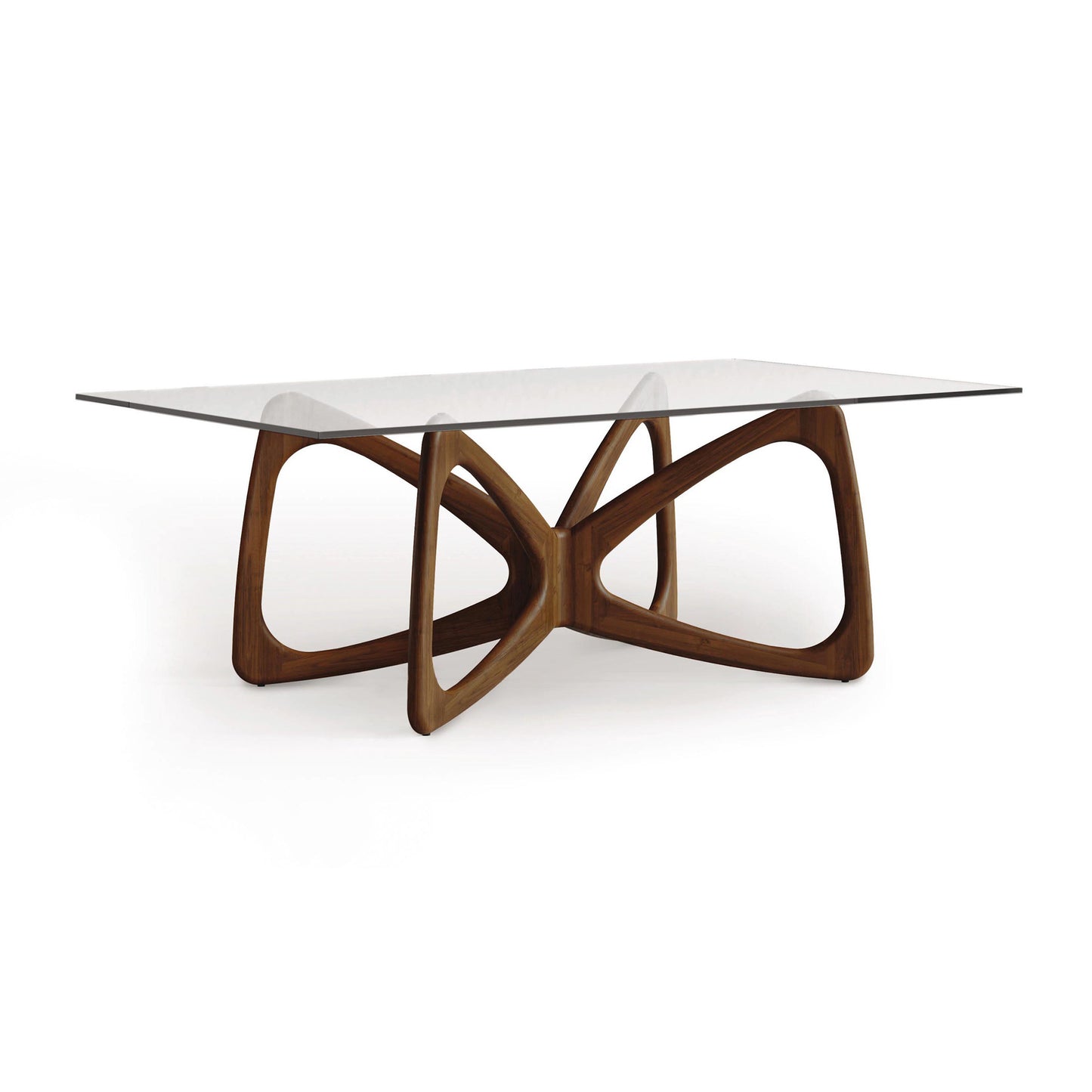 Copeland Butterfly Glass Top Dining Table with sculptural hardwood base, showcasing contemporary American craftsmanship.