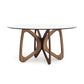 Butterfly Round Glass Top Table by Copeland Furniture, American-made with a sculptural hardwood base and elegant, modern round glass surface.
