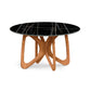 Butterfly Round Sintered Stone Top Table by Copeland Furniture with black marble-look top and sculptural light wood base, American made.