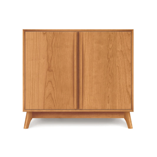 Copeland Furniture Catalina 2-Door Buffet featuring solid wood construction, sleek minimalist design, and signature angled legs.