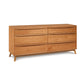 Catalina 6-Drawer Dresser by Copeland Furniture in solid wood with a light brown finish and tapered legs.