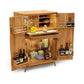 Catalina Bar Cabinet by Copeland Furniture shown with open doors, highlighting its spacious shelves and wine storage. Glassware and bottles displayed inside.