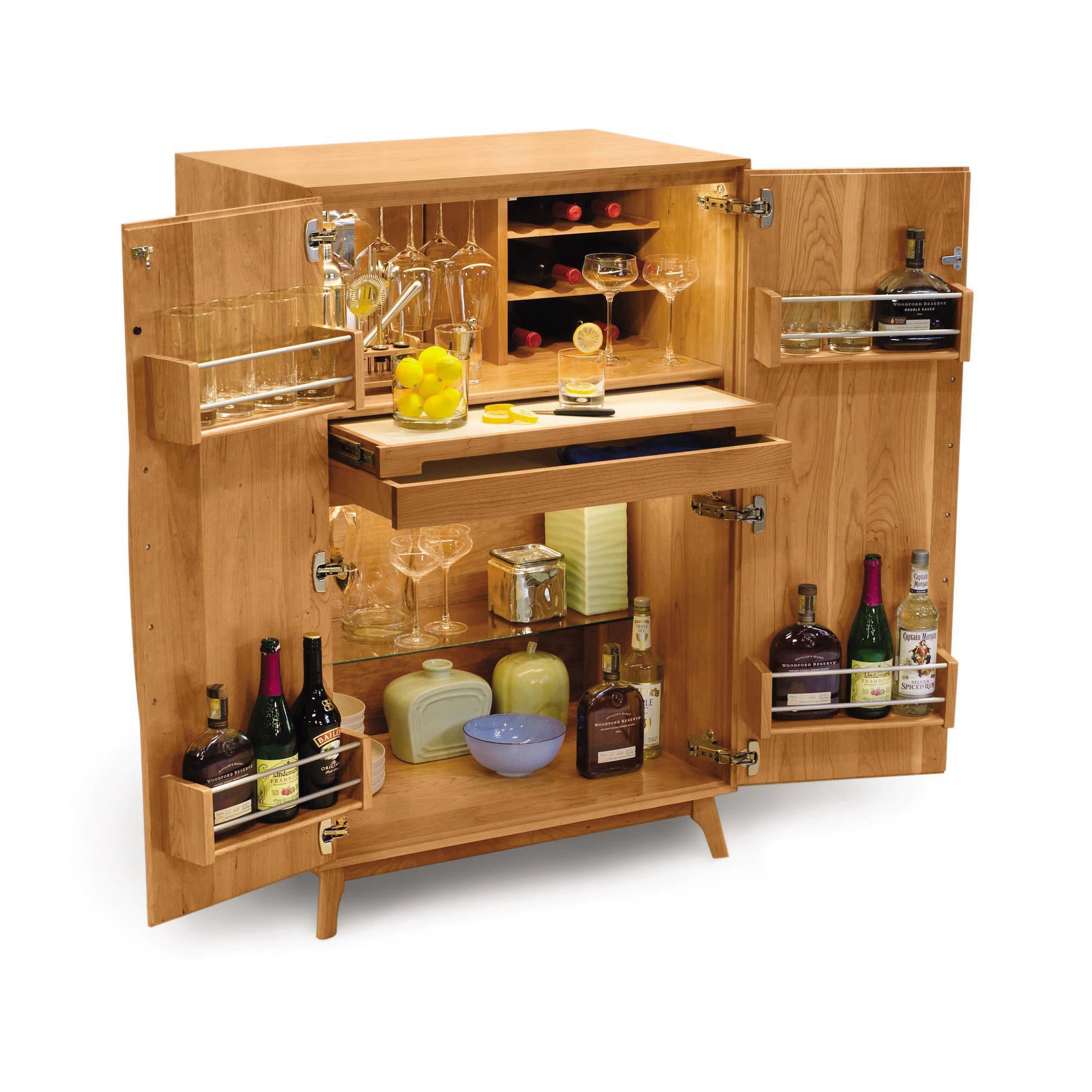 Catalina Bar Cabinet by Copeland Furniture shown with open doors, highlighting its spacious shelves and wine storage. Glassware and bottles displayed inside.