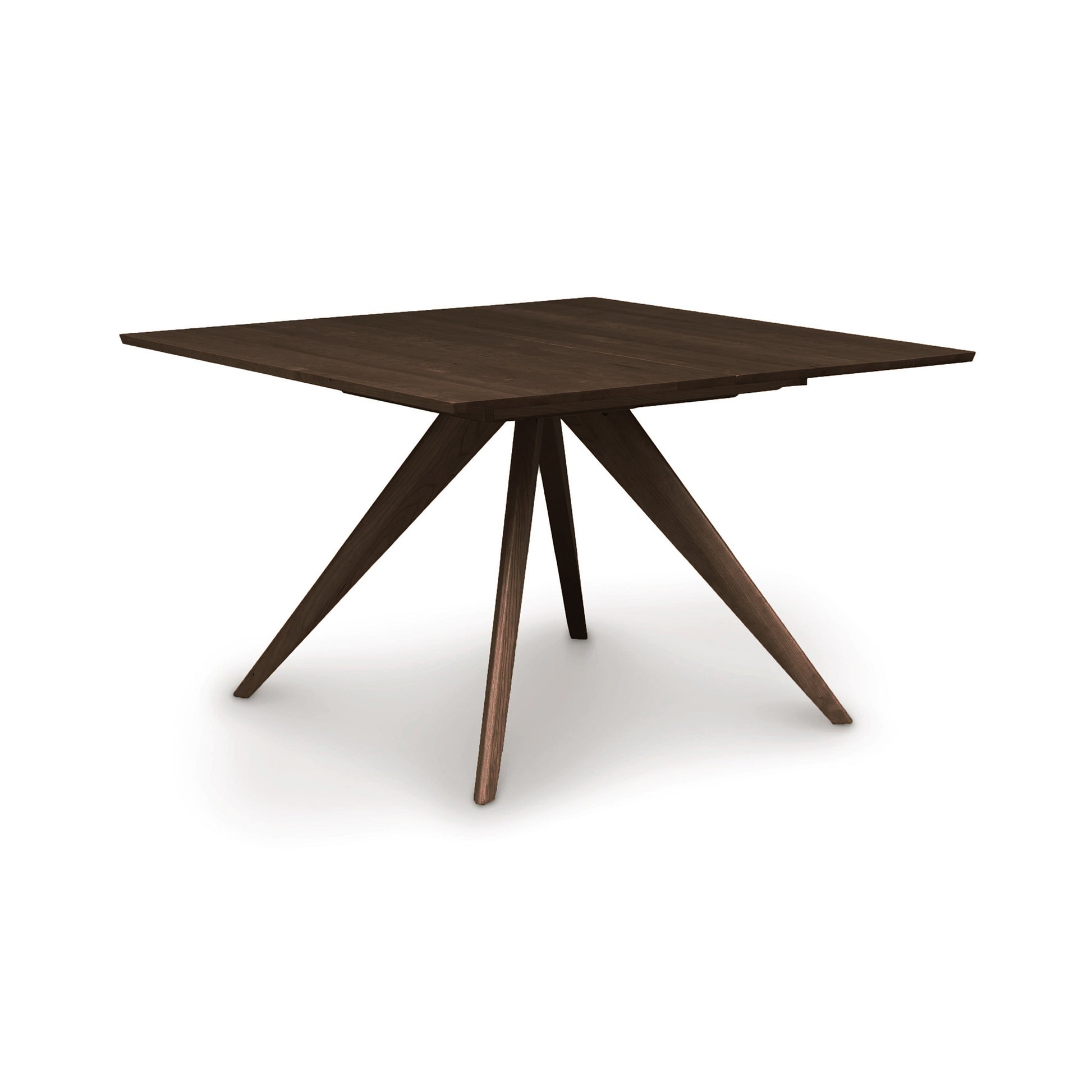 Catalina Square Extension Dining Table by Copeland Furniture with mid-century design, dark wood finish, and distinctive angled center legs.