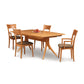 Catalina Trestle Extension Table by Copeland Furniture in solid American hardwood with four matching chairs, showcasing fine craftsmanship.