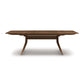 Copeland Catalina Trestle Extension Table made of solid American hardwood, featuring distinctive angled legs and a sturdy support bar.