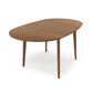 Copeland Furniture Catalina Drop-Leaf Dining Table in solid wood, oval shape with four straight legs, showcasing American craftsmanship.