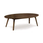 Catalina Oval Coffee Table by Copeland Furniture, showcasing mid-century style with four angled legs in sustainably harvested hardwood.