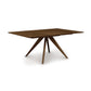 A dining table with two legs and a wooden top.