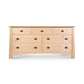 Cherry Moon 7-Drawer Dresser by Maple Corner Woodworks, handmade in Vermont from eco-friendly light cherry wood with contrasting dark handles.