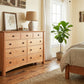 Maple Corner Woodworks Cherry Moon 9-Drawer Dresser in cherry wood, showcasing expert American craftsmanship and spacious storage.
