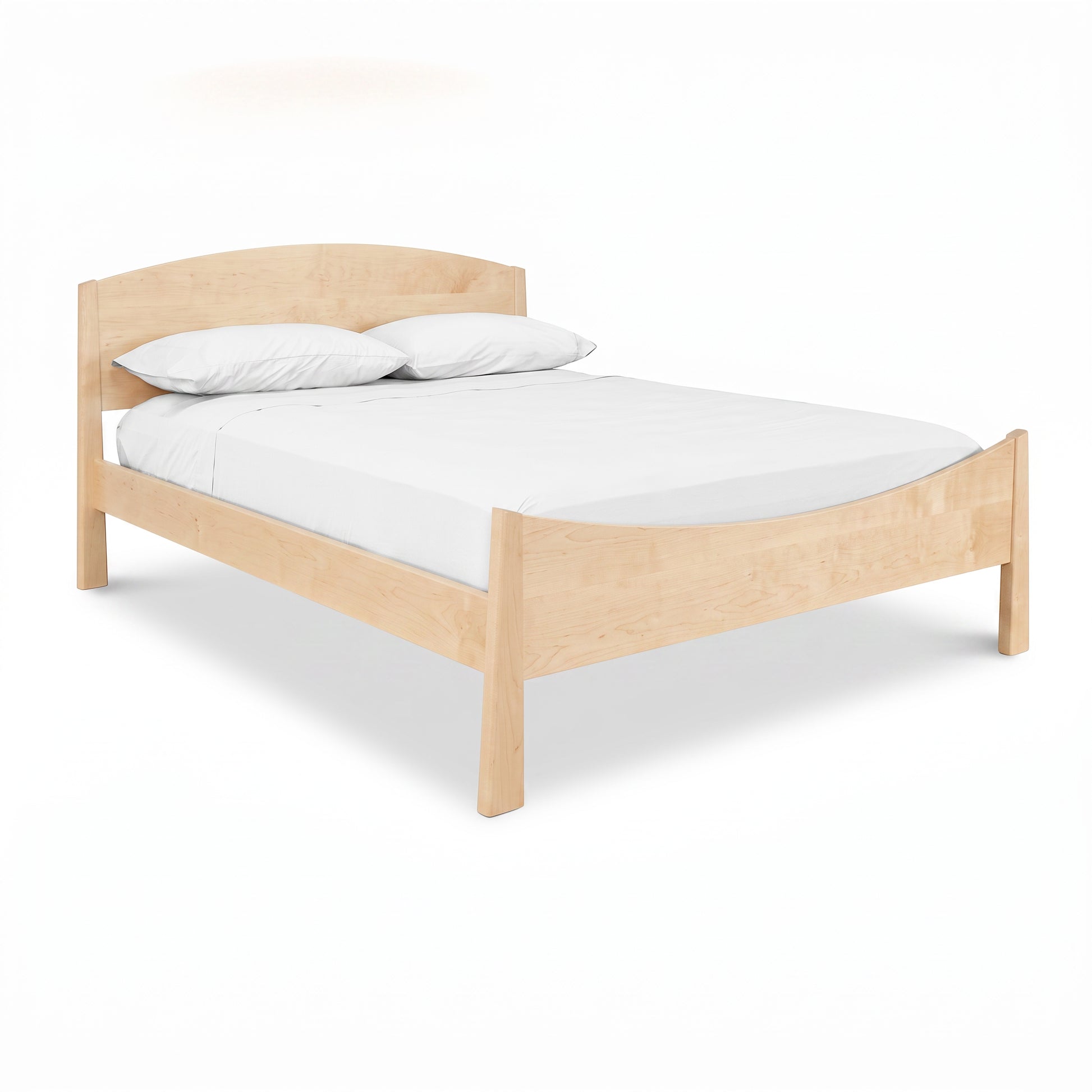 Cherry Moon Bed by Maple Corner Woodworks with a curved headboard, white mattress, and pillows; expertly crafted American-made hardwood furniture.