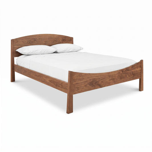 Cherry Moon Bed by Maple Corner Woodworks featuring solid walnut wood, gently curved headboard, and fine American craftsmanship.