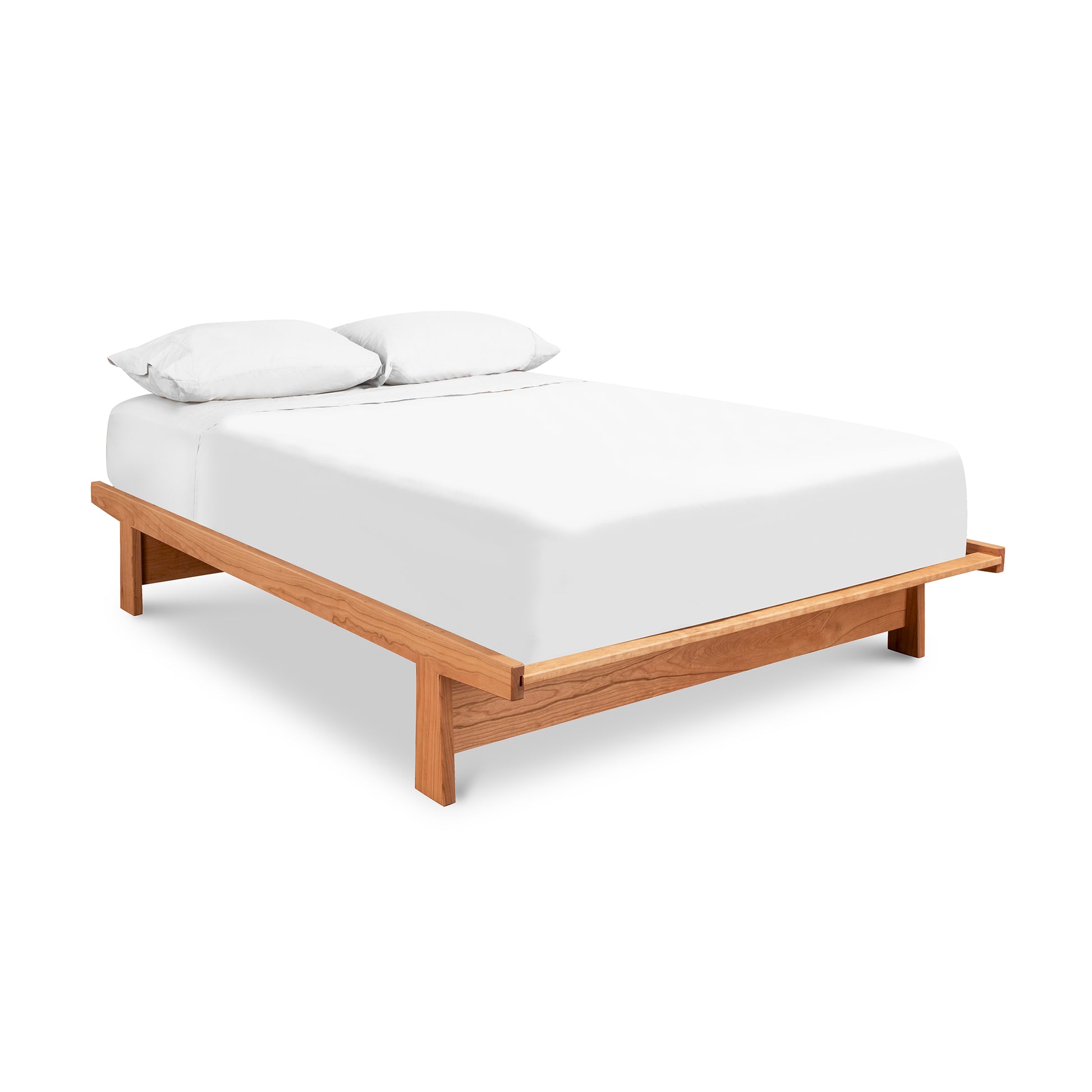Cherry Moon Dovetail Platform Bed crafted from solid, sustainably harvested wood with eco-friendly finish highlighting its natural elegance.