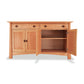 Cherry Moon Large Sideboard by Maple Corner Woodworks, showcasing sustainably harvested hardwoods with two closed drawers, open cabinet doors, interior shelf, and eco-friendly oil finish.