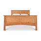 Cherry Moon Panel Bed by Maple Corner Woodworks showcasing a tall headboard, matching footboard, and natural cherry wood finish.