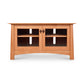Cherry Moon 49" TV-Media Console, wooden stand with glass-panel doors, interior shelves, and dark handles by Maple Corner Woodworks.