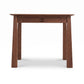 Maple Corner Woodworks Cherry Moon Writing Desk features a cherry finish, single drawer, and round handle, handcrafted in America.