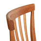 Lyndon Furniture Classic Shaker Chair #1 featuring a curved top rail, vertical slats, smooth finish, and warm wood tones.