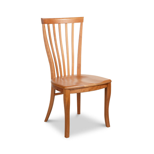 Lyndon Furniture Classic Shaker Chair #1 with a scooped wooden seat and slatted back, highlighting its handcrafted details.