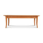 Classic Shaker Flare Leg Coffee Table by Lyndon Furniture with elegantly curved legs and a smooth rectangular top, showcasing fine American craftsmanship.