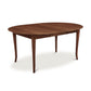 Classic Shaker Flare Leg Extension Table by Lyndon Furniture, crafted in natural hardwood with a round top and elegant flared legs.