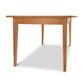 Lyndon Furniture Classic Shaker Boat Top Table made of natural hardwood with four legs, highlighting elegant craftsmanship and solid design.