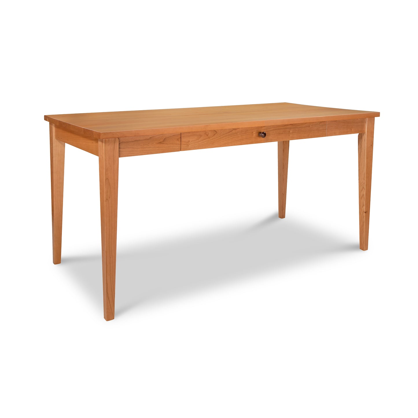 Lyndon Furniture Classic Shaker Writing Desk with solid wood construction, four straight legs, and a single center drawer.