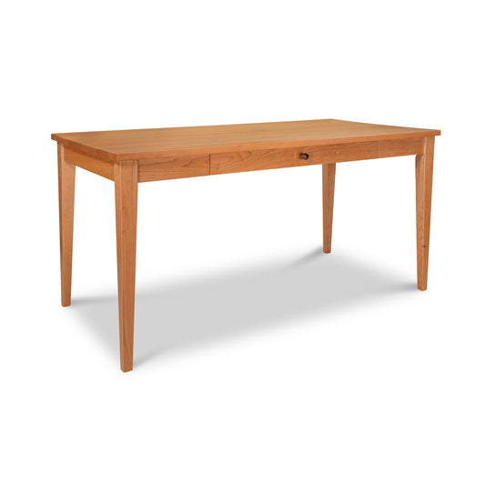 Lyndon Furniture Classic Shaker Writing Desk with solid wood construction, four straight legs, and a single center drawer.