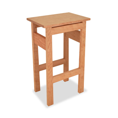 Contemporary Asian Stool by Maple Corner Woodworks, handcrafted from solid wood with a rectangular seat, flat top surface, and four legs connected by horizontal supports; simple yet elegant design.