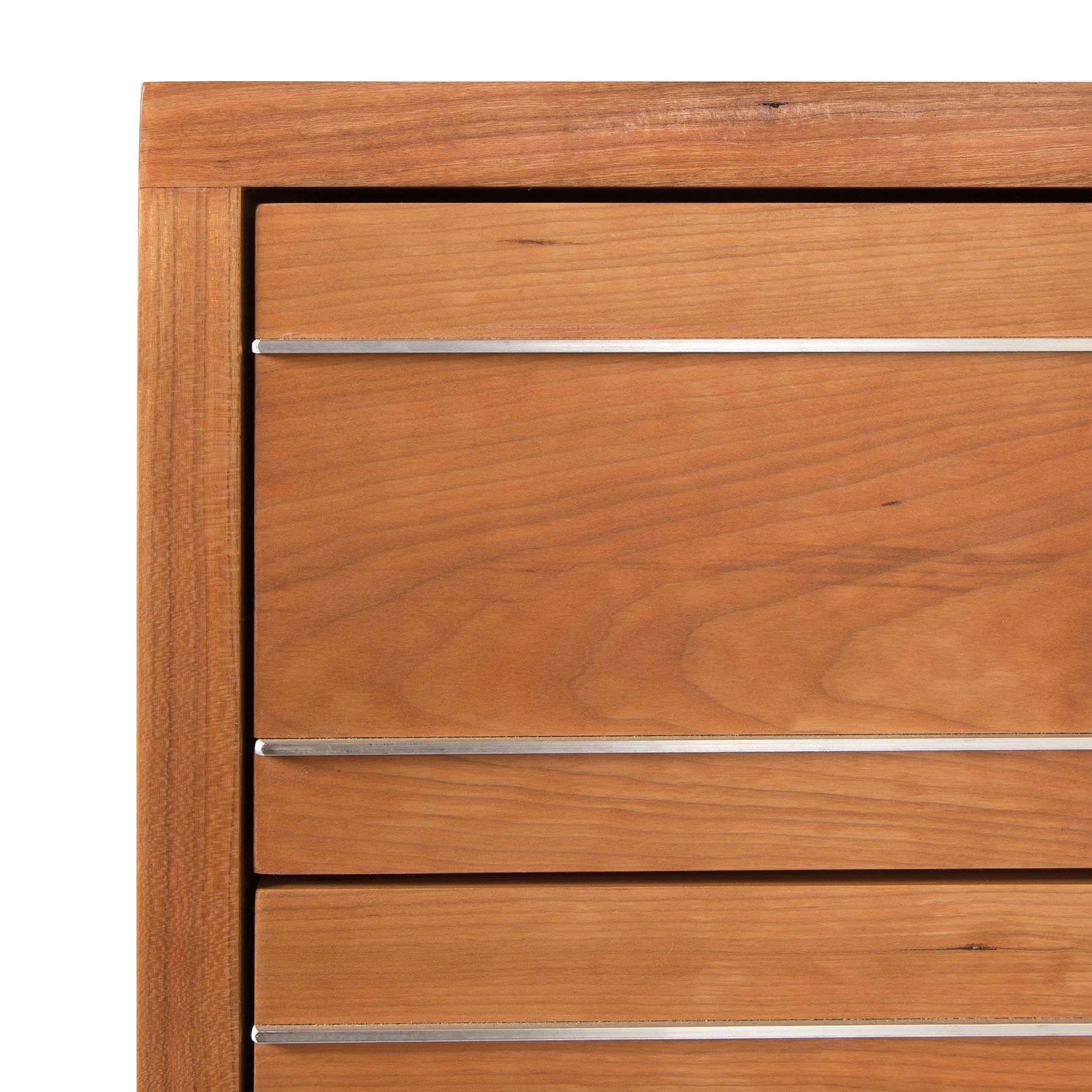 Contemporary Cable 5-Drawer Chest by Vermont Furniture Designs with sleek horizontal metal handles and smooth wood finish, showcasing modern craftsmanship.