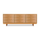 Contemporary Cable 9-Drawer Dresser crafted from solid hardwood with nine spacious drawers and sleek black metal handles.