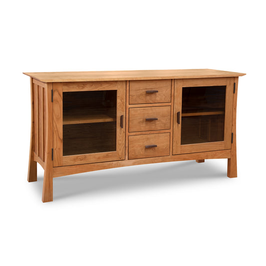 Contemporary Craftsman 3-Drawer Media Console by Vermont Furniture Designs featuring glass-front cabinets and clean, modern lines.