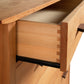 Vermont Furniture Designs Contemporary Craftsman 5-Drawer Chest featuring dovetail joints and an eco-friendly oil finish, highlighting fine craftsmanship and wood grain details.