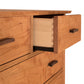 Contemporary Craftsman 7-Drawer Chest made of solid hardwood with dark handles, dovetail joints, and eco-friendly finish by Vermont Furniture Designs.