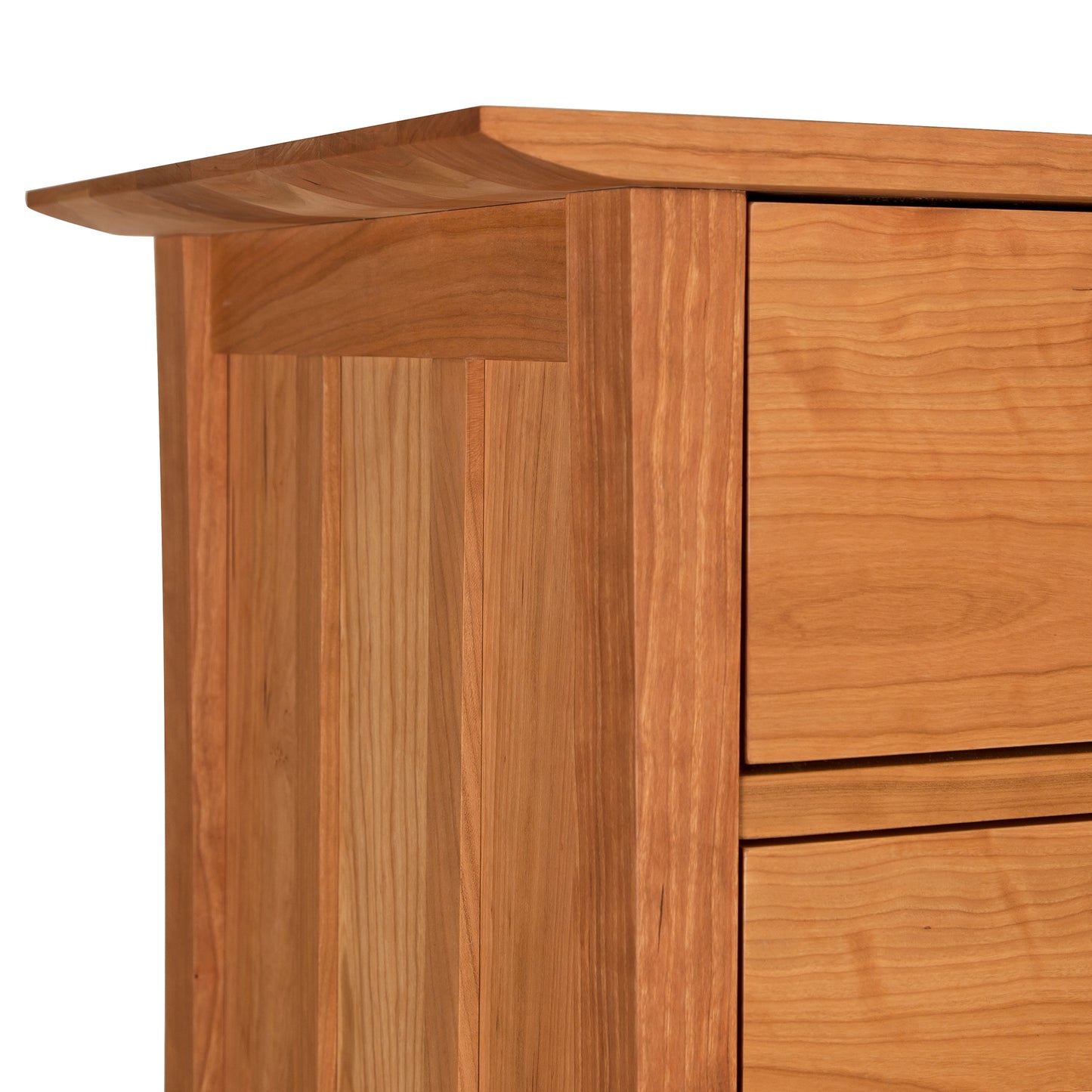 Vermont Furniture Designs Contemporary Craftsman 7-Drawer Chest made of solid hardwood with eco-friendly finish, showcasing its detailed craftsmanship and elegant design.